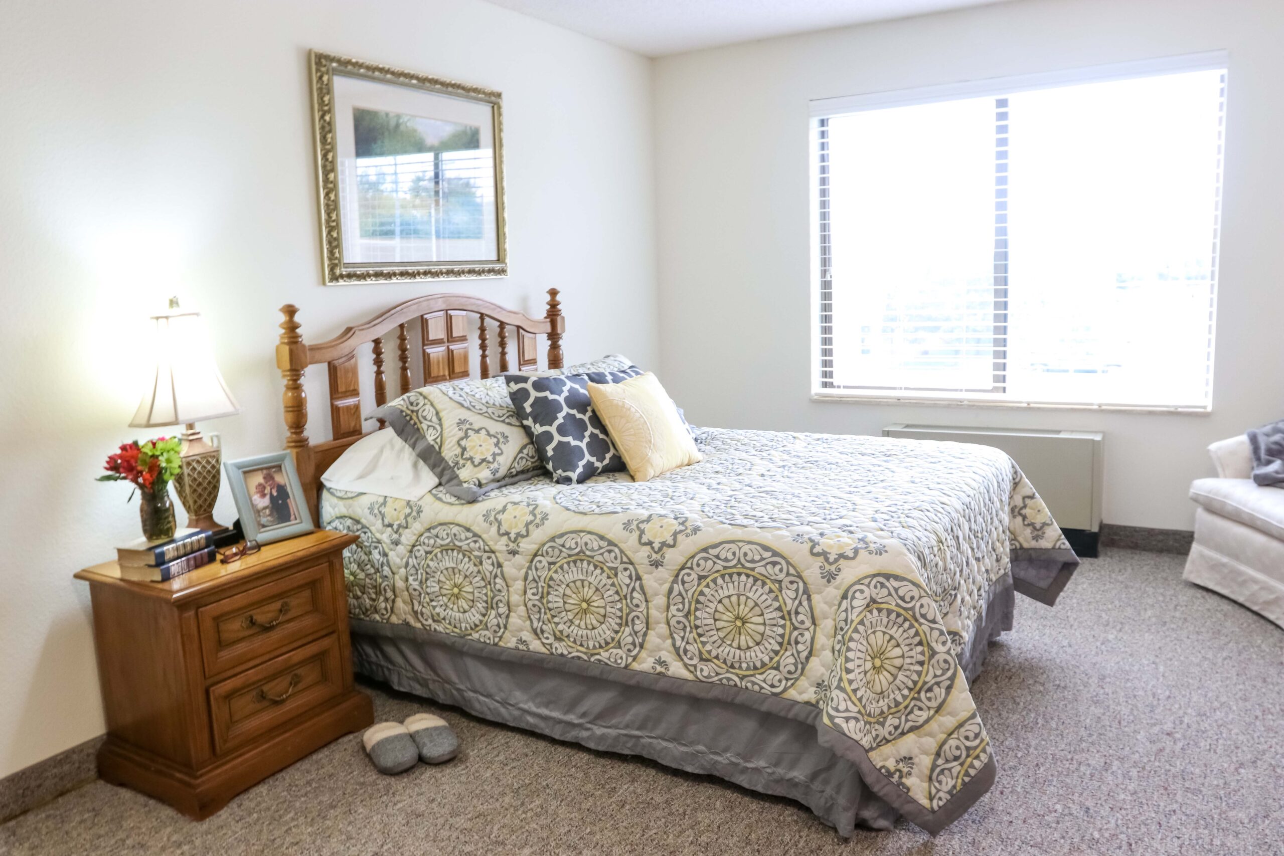 Interior image of a resident's apartment bedroom at Sedgwick Plaza.